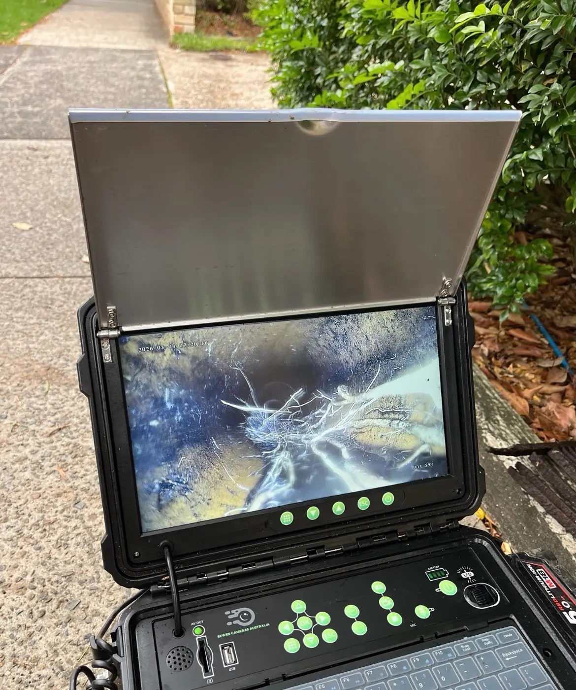 CCTV view showing tree roots in a sewer line