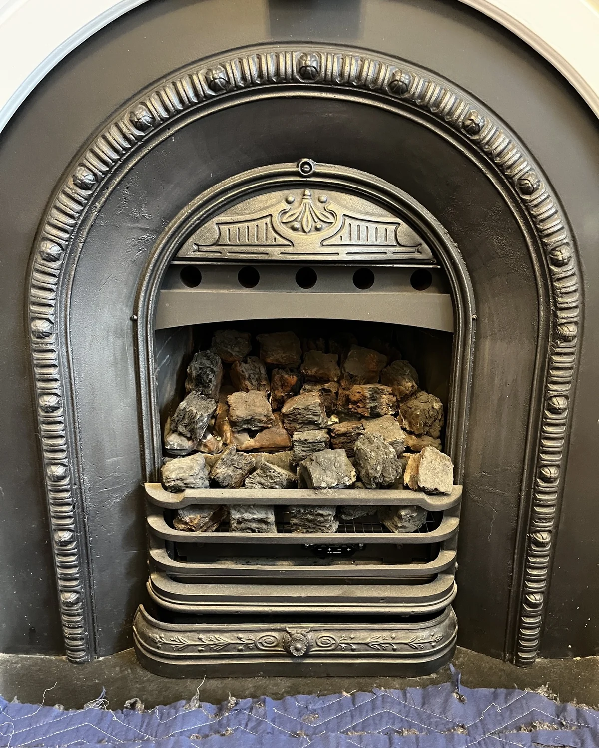 Gas fireplace components assessed during a Peach Plumbing service