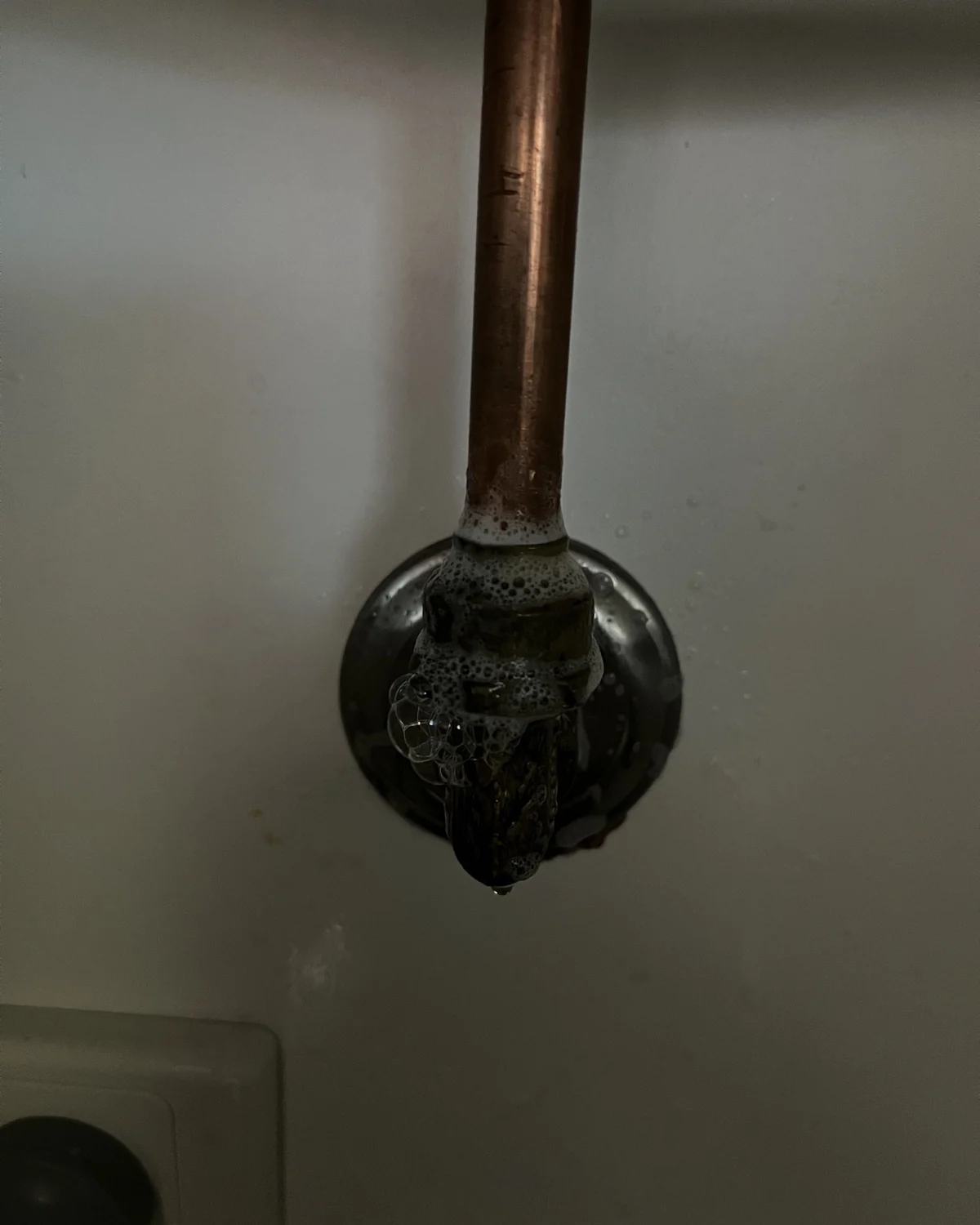 Gas pipe fitting checked during a Peach Plumbing leak investigation