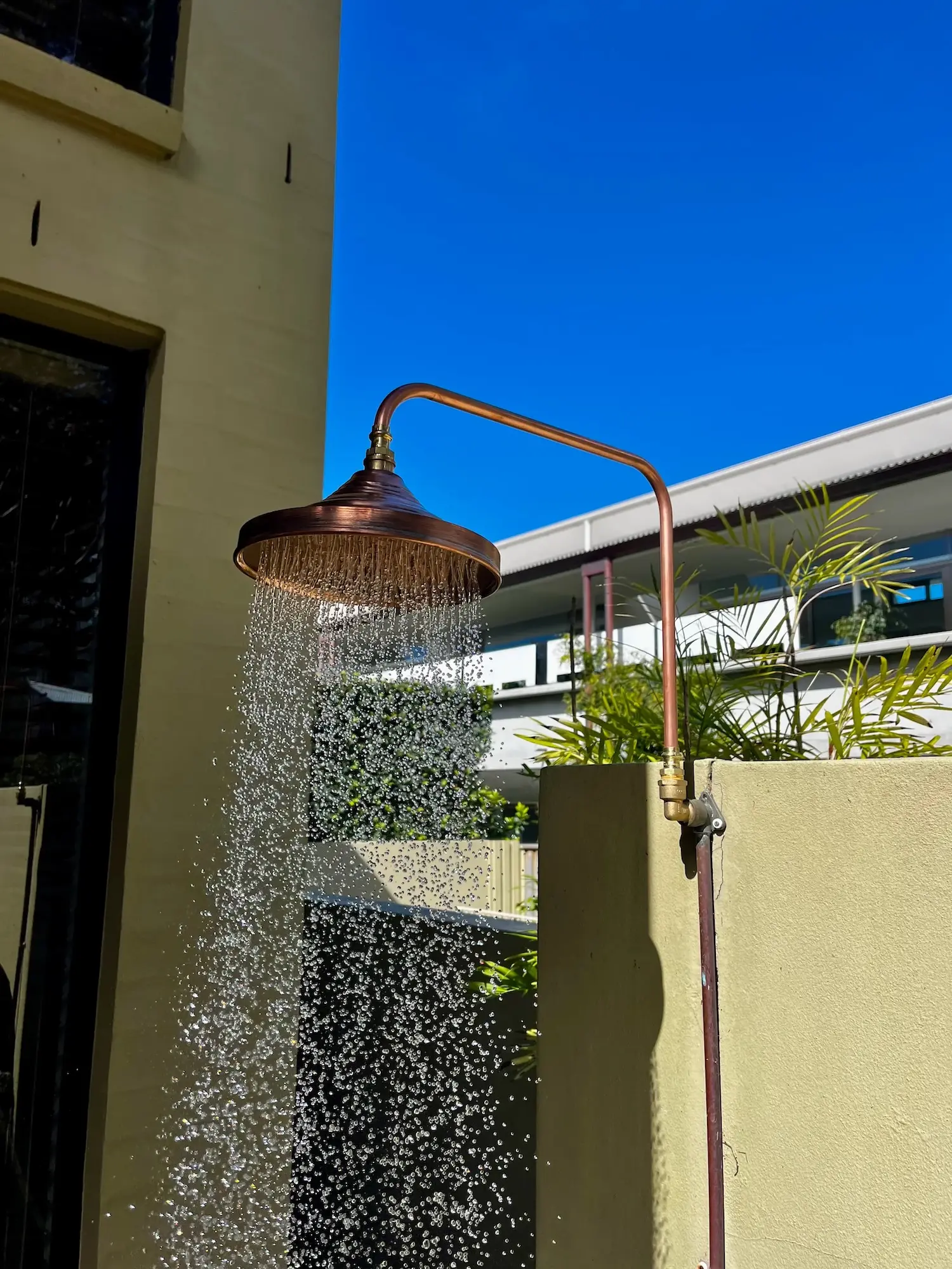 Outdoor shower running during final testing